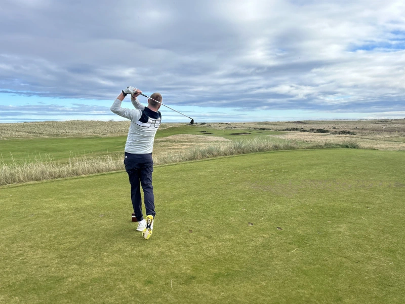 Daniel Wood driving off tee